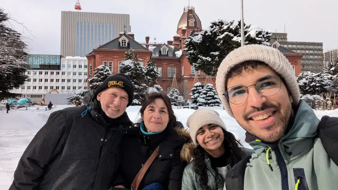 Fadil guiding travelers around Sapporo